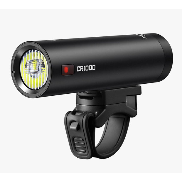 RAVEMEN CR1000 bike front light with black housing and visible LED lights, mounted on a bike handlebar.